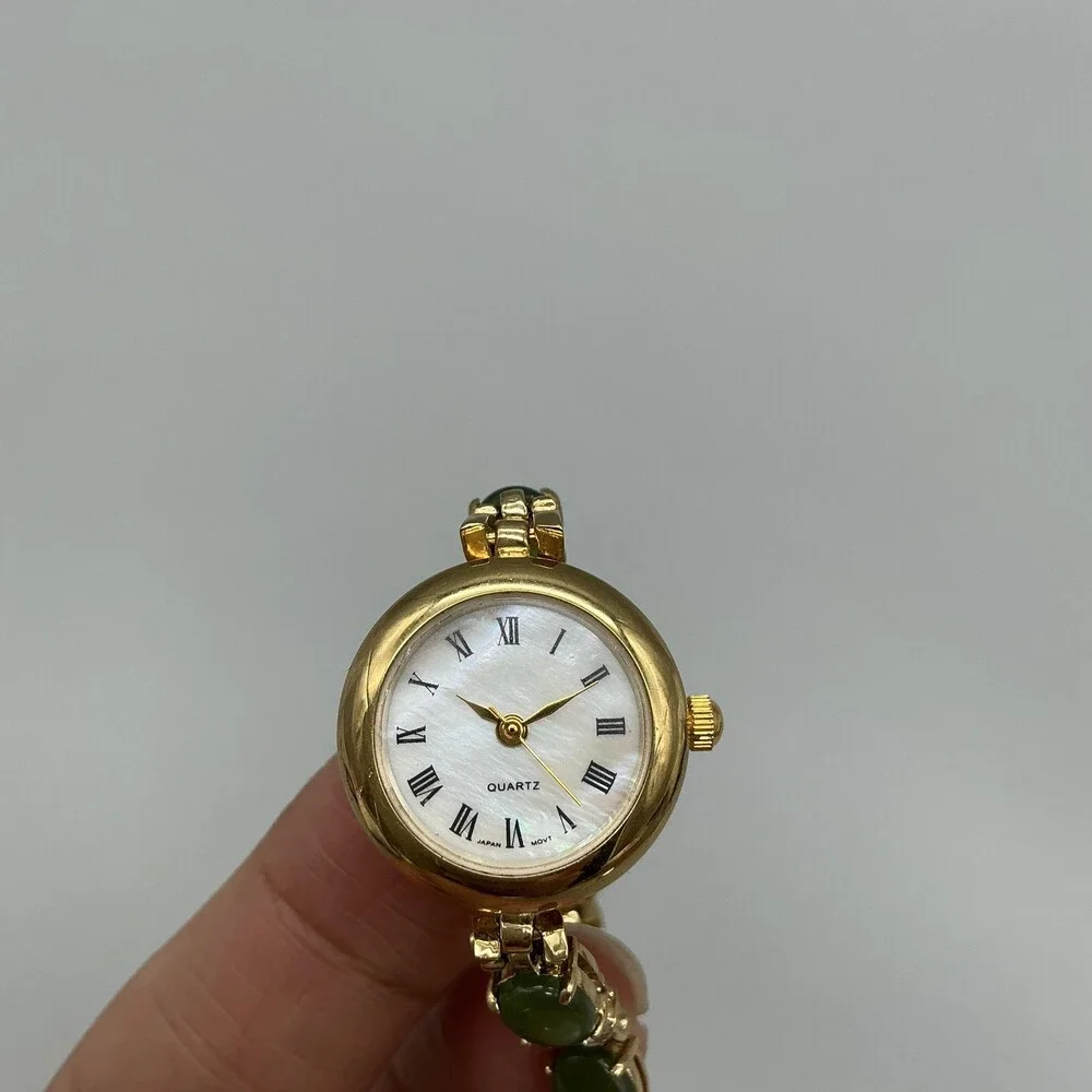 HMI Womens Watch 22mm MOP Gold Tone Green Stone Bracelet New Battery 7.25